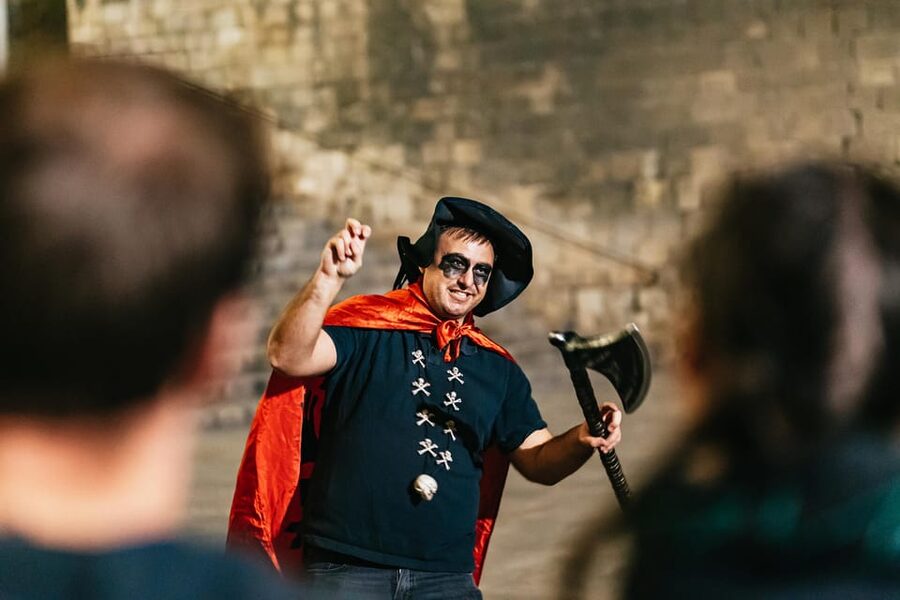 Barcelona: Gothic Quarter Ghosts and Legends Walking Tour - Walking through Barcelona after sunset