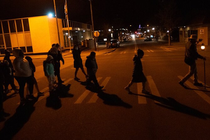 Downtown Flagstaff Haunted History Tour - Flying books and page 666 at the library