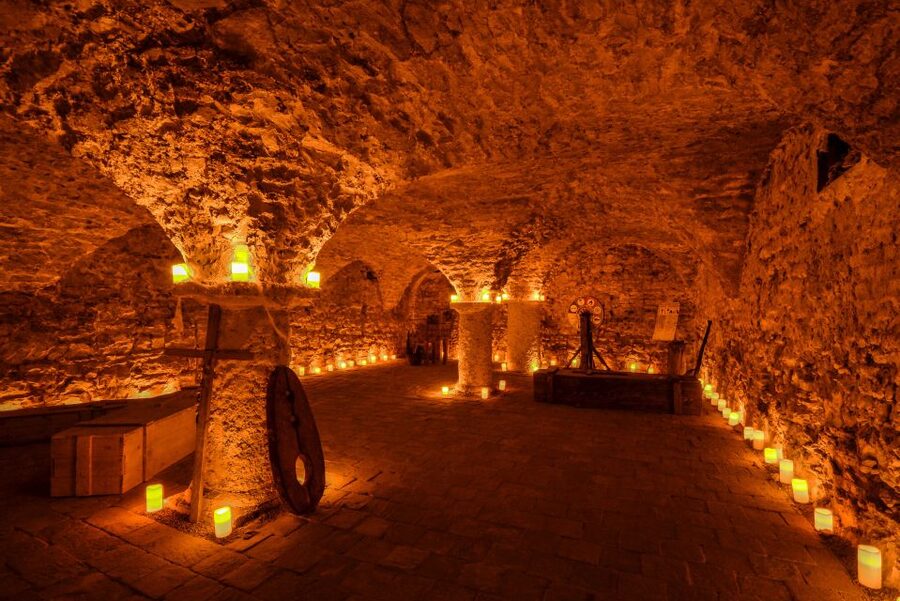 Prague: Ghosts, Legends, Medieval Underground & Dungeon Tour - Below street level in the medieval underground