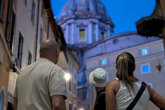 Rome Secrets with Dark History and Tasty Bites Tour Experience - Starting beneath the ruins of Portico d’Ottavia