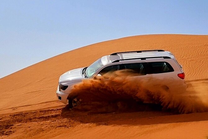 The Ghost Village Safari Tour with Dune Bashing and Sandboarding - The 3 p.m. Pickup and Ride to the Desert