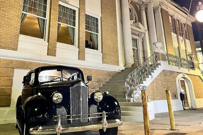 The Official Ybor City Ghost Tour - Inside the Cuban Club with ghost-hunting equipment