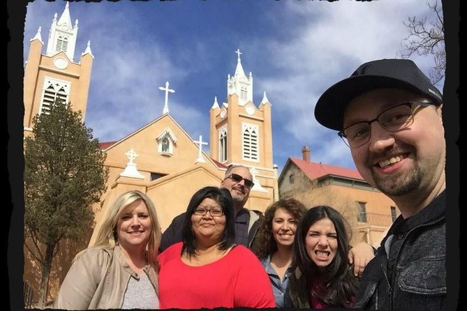 The Original 8pm Ghost Tour of Old Town Albuquerque - since 2001 - San Felipe de Neri Church under evening light